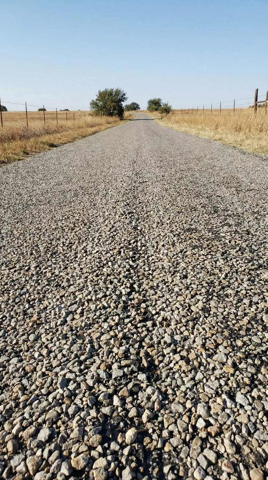 Finished chip seal road through rangeland